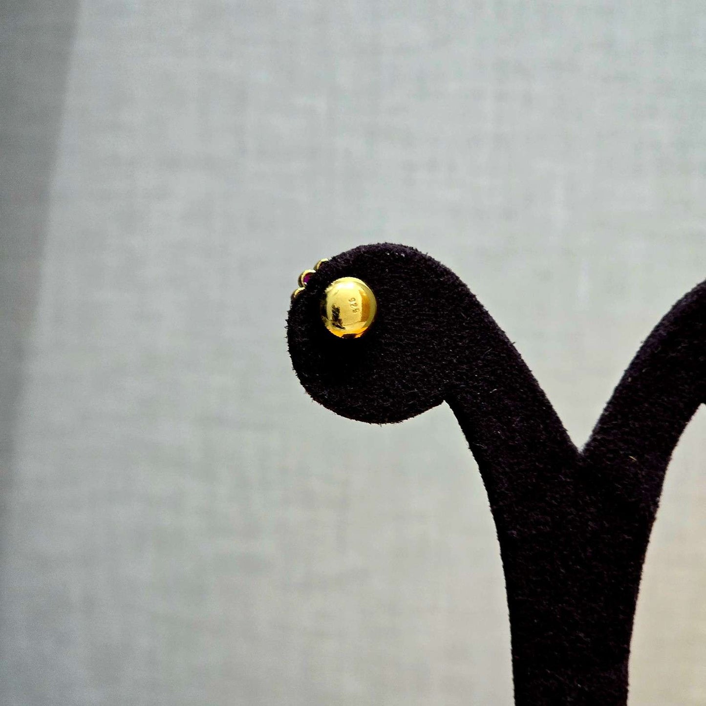 Oval Ruby Border Studs