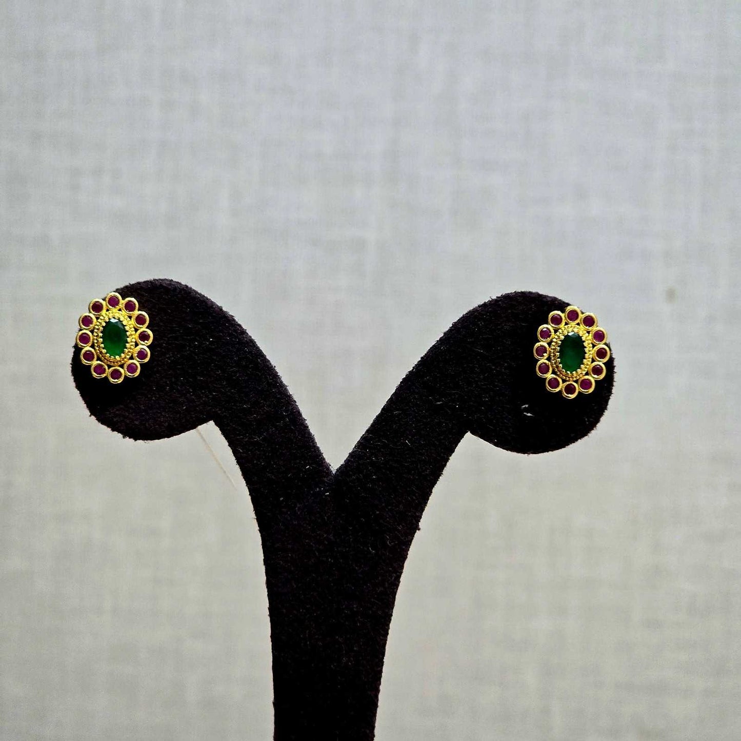 Oval Ruby Border Studs