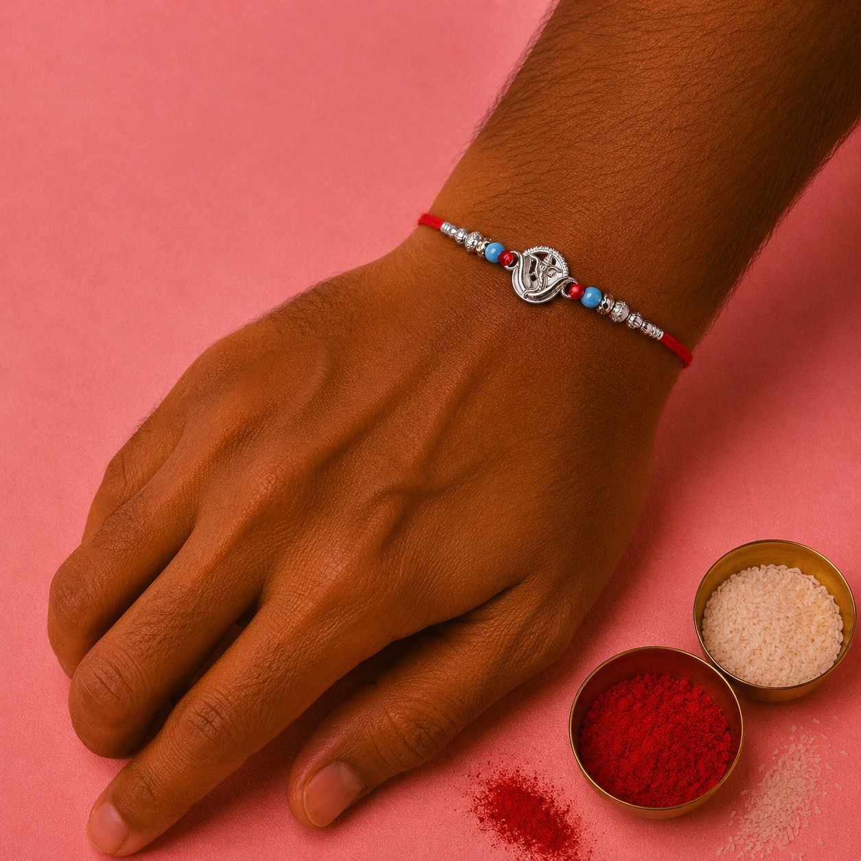Ganesh Face Rakhi