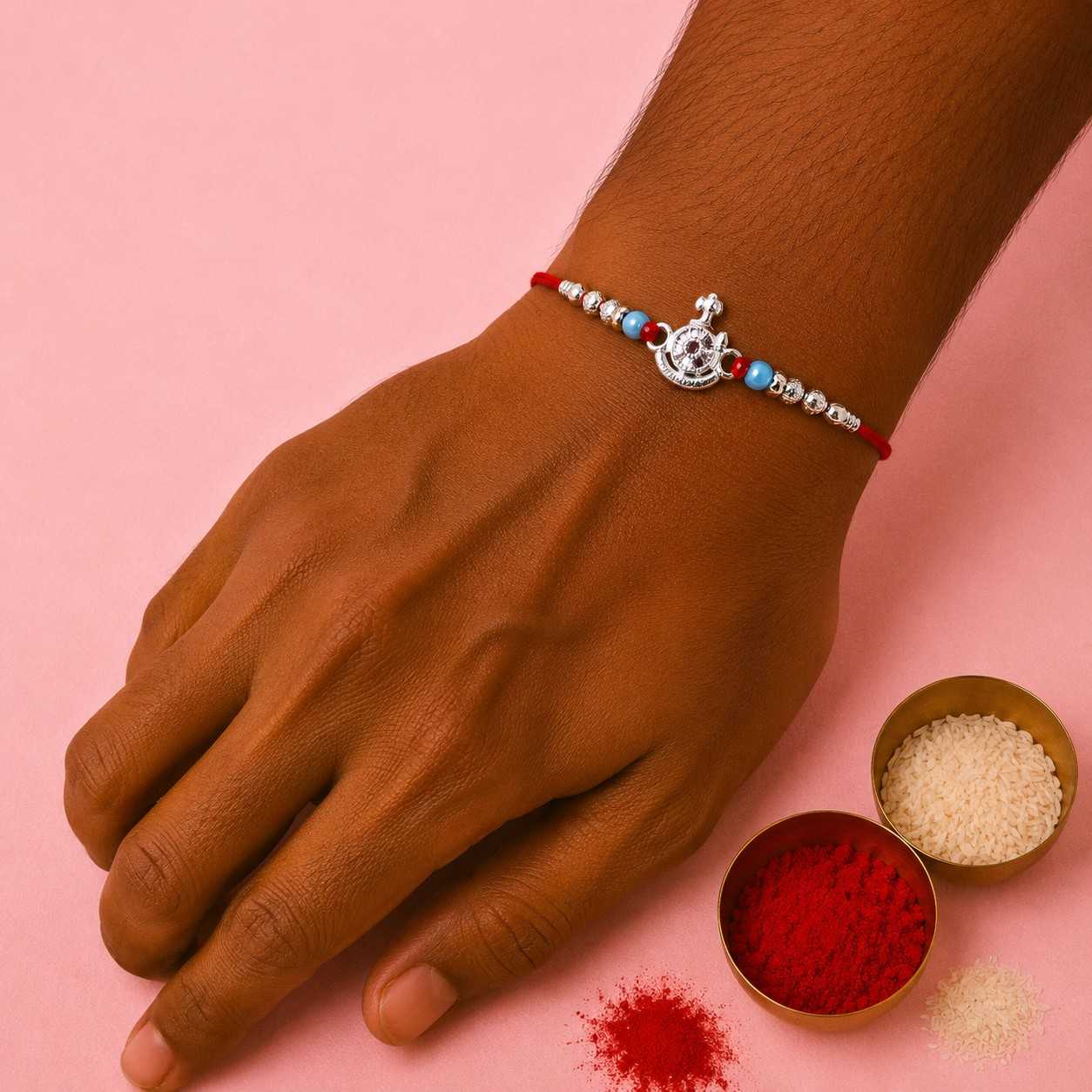 Ganesh Pink Stone Rakhi