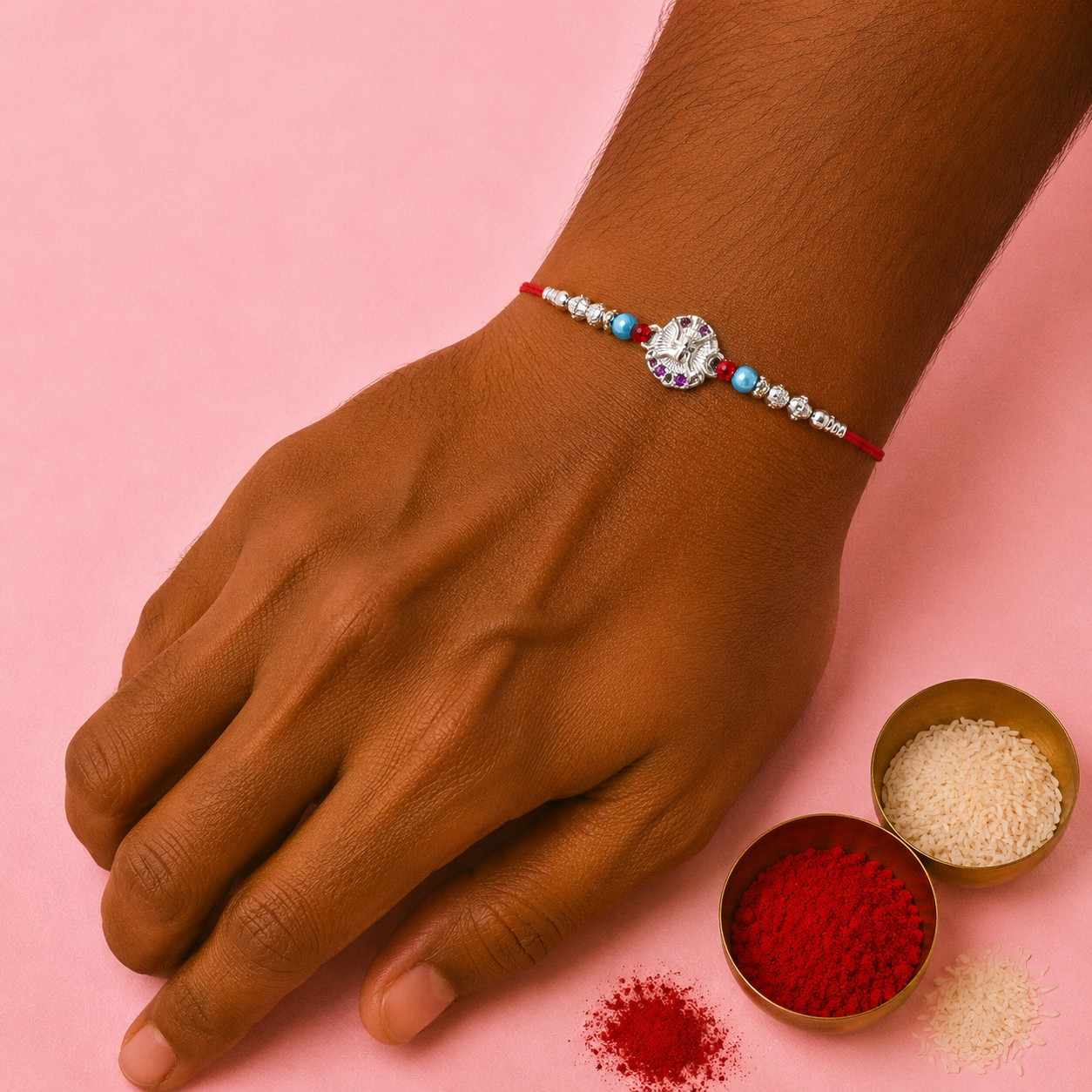 Swastik Pink Stone Rakhi